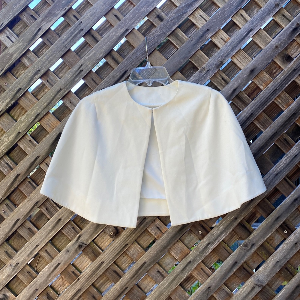 White shoulder cape